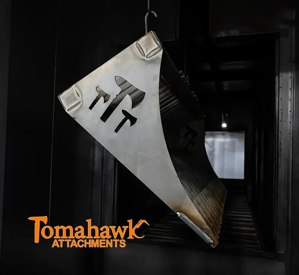 A Tomahawk Attachments Rock Bucket, skid steer attachment, preparing for powder coat, at DH Machine in Nappanee, Indiana.